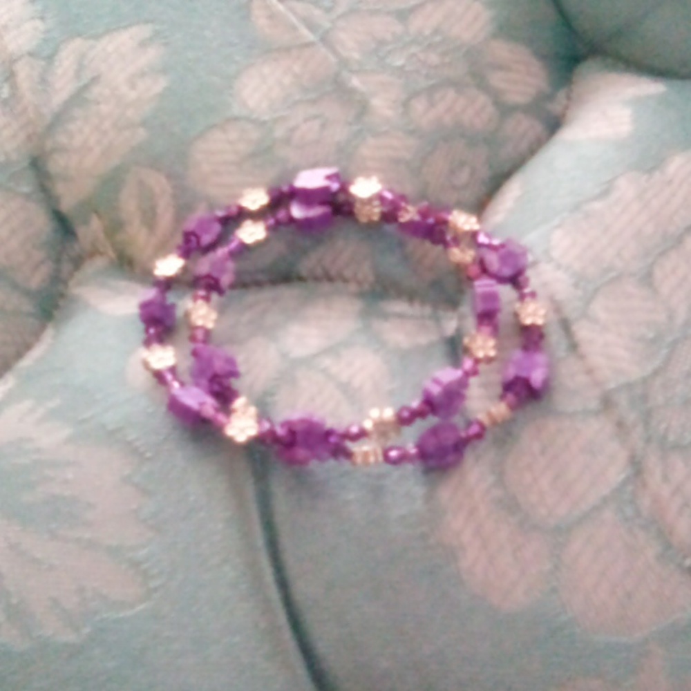 Purple butterfly and silver flower charm bracelet
